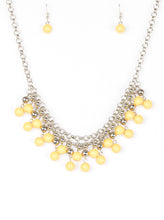 Load image into Gallery viewer, Rows of classic silver and sunny yellow beads trickle from two rows of interlocking silver chains, creating a bold colorful fringe below the collar. Features and adjustable clasp closure.  Sold as one individual necklace. Includes one pair of matching earrings.