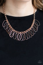 Load image into Gallery viewer, Oval shiny copper, rose gold, and silver frames dangle from a bold rose gold chain, creating a dizzying fringe below the collar. Features an adjustable clasp closure.  Sold as one individual necklace. Includes one pair of matching earrings.  Always nickel and lead free.