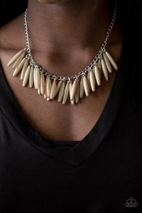 Polished and cloudy Soybean beads cascade from the bottom of a shimmery silver chain, creating a colorful fringe below the collar. Features an adjustable clasp closure.  Sold as one individual necklace. Includes one pair of matching earrings.  Always nickel and lead free.