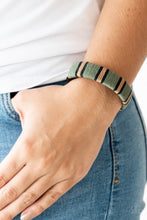 Load image into Gallery viewer, Earthy black, brown, and green thread winds around a brown leather band for a rustic look. Features an adjustable snap closure.  Sold as one individual bracelet.  Always nickel and lead free.