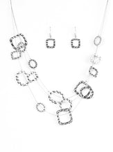 Load image into Gallery viewer, Delicately hammered in shimmer, round and square shiny silver frames are secured in place along three glistening wires. The floating frames drape below the collar in a refined fashion. Features an adjustable clasp closure. Sold as one individual necklace. Includes one pair of matching earrings.