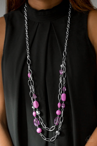 Featuring smooth and faceted surfaces, purple and shiny silver beads trickle along bold silver chains for a seasonal look. Features an adjustable clasp closure.  Sold as one individual necklace. Includes one pair of matching earrings.