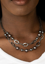 Load image into Gallery viewer, Necklace:  Two rows of classic gunmetal and pearly black beads, and glistening gunmetal hoops link below the collar in a refined fashion. Features an adjustable clasp closure.  Bracelet: Two rows of classic gunmetal and pearly black beads, and glistening gunmetal hoops link around the wrist in a refined fashion. Features an adjustable clasp closure.  Sold as one individual necklace, earrings, and bracelet.