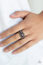 Load image into Gallery viewer, Dotted silver filigree coalesces into an ornate band. The center of the frilly frame is encrusted in a glittery row of purple rhinestones for a refined finish. Features a dainty stretchy band for a flexible fit.  Sold as one individual ring.  Always nickel and lead free.