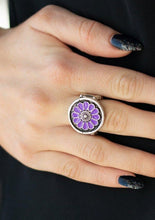 Load image into Gallery viewer, Brushed in an antiqued shimmer, vivacious purple petals spin into a whimsical floral pattern atop the finger. Features a stretchy band for a flexible fit.  Sold as one individual ring.