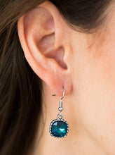 Load image into Gallery viewer, Chiseled into an alluring square style cut, a faceted blue gem is pressed into a serrated silver frame for a regal look. Earring attaches to a standard fishhook fitting.  Sold as one pair of earrings.