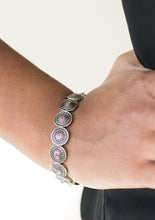 Load image into Gallery viewer, Ornate silver frames are threaded along elastic stretchy bands, linking across the wrist in a seasonal fashion. Dainty pink rhinestones are pressed into the centers of the round frames, adding a colorful finish to the whimsical palette.  Sold as one individual bracelet. 