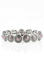 Load image into Gallery viewer, Ornate silver frames are threaded along elastic stretchy bands, linking across the wrist in a seasonal fashion. Dainty pink rhinestones are pressed into the centers of the round frames, adding a colorful finish to the whimsical palette.  Sold as one individual bracelet.