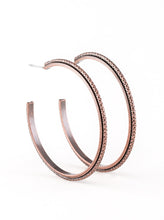 Load image into Gallery viewer, Etched in diamond cut textures, a shimmery copper hoop curls around a smooth copper frame, coalescing into an edgy hoop. Earring attaches to a standard post fitting. Hoop measures 2&quot; in diameter.  Sold as one pair of hoop earrings.