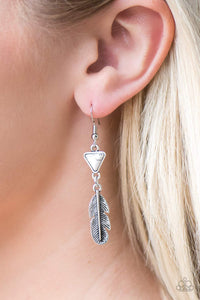 A shimmery silver feather charm swings from the bottom of a triangular white stone for a free-spirited look. Earring attaches to a standard fishhook fitting.  Sold as one pair of earrings.  Always nickel and lead free.