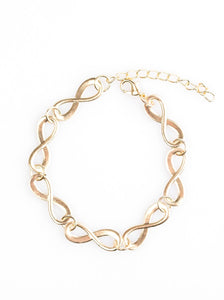 Glistening gold infinity charms link around the wrist. Brushed in an incandescent shimmer, the elegant infinities join into a timeless palette. Features an adjustable clasp closure.  Sold as one individual bracelet.