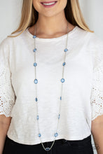 Load image into Gallery viewer, Featuring sleek silver fittings, an array of glassy Blue Depths gemstones trickle along a shimmery silver chain for a glamorous look. Features an adjustable clasp closure.  Sold as one individual necklace. Includes one pair of matching earrings.  Always nickel and lead free.