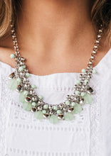 Load image into Gallery viewer, Refreshing Spearmint and glistening silver teardrops drip from the bottom of interlocking silver chains. Matching Spearmint beads in varying opacity and shiny silver accents trickle down the rows of chain, creating a flirty fringe below the collar. Features an adjustable clasp closure. 