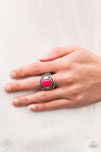 A shiny pink bead is pressed into the center of a silver band embossed in vine-like filigree for a whimsical pop of color. Features a stretchy band for a flexible fit.