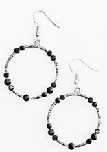 Load image into Gallery viewer, Glittery black rhinestones are sporadically sprinkled along a hammered silver hoop, creating a shimmery lure. Earring attaches to a standard fishhook fitting. Sold as one pair of earrings.