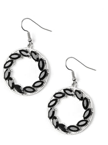 Featuring regal marquise style cuts, glittery black rhinestones are encrusted along a shimmery silver hoop for a radiant fashion. Earring attaches to a standard fishhook fitting.  Sold as one pair of earrings.