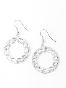 Featuring regal marquise style cuts, glittery white rhinestones are encrusted along a shimmery silver hoop for a radiant fashion. Earring attaches to a standard fishhook fitting.  Sold as one pair of earrings.