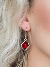 Load image into Gallery viewer, A faceted red gem is pressed into an abstract silver frame for a refined look. Earring attaches to a standard fishhook fitting.  Sold as one pair of earrings.  