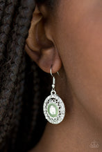 Load image into Gallery viewer, A pearly green bead is pressed into the center of an ornate silver frame radiating with glassy white rhinestones for a regal look. Earring attaches to a standard fishhook fitting. Sold as one pair of earrings. Always nickel and lead free.