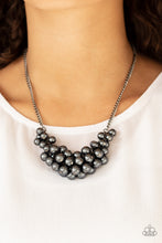 Load image into Gallery viewer, A collection of pearly gunmetal beads dangle from the bottom of a glistening gunmetal chain, creating a glamorously clustered display below the collar. Features an adjustable clasp closure.  Sold as one individual necklace. Includes one pair of matching earrings. Always nickel and lead free.