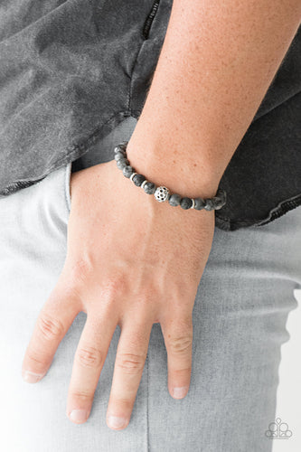 Essential Oil Alert!!! Infused with silver accents, earthy lava rocks and natural stone beads are threaded along a stretchy band for a seasonal look.  Sold as one individual bracelet.  Always nickel and lead free.