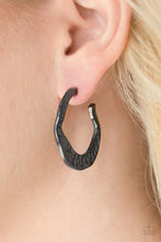 Load image into Gallery viewer, Delicately hammered in shimmery textures, a glistening ribbon of gunmetal curls into an edgy, asymmetrical hoop. Earring attaches to a standard post fitting. Hoop measures 1” in diameter.  Sold as one pair of hoop earrings.  ﻿Always nickel and lead free!