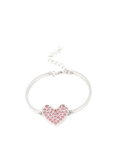 Load image into Gallery viewer, A pink rhinestone encrusted silver heart frame delicately links to two dainty silver bars arcing around the wrist, creating a dazzling centerpiece. Features an adjustable clasp closure.  Sold as one individual bracelet.  