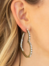 Load image into Gallery viewer, Encrusted in sections of glittery white rhinestones, a glistening brass hoop curls into a charming heart shape for a heart-stopping look. Earring attaches to a standard post fitting. Hoop measures approximately 2&quot; in diameter.  Sold as one pair of hoop earrings. Always nickel and lead free.