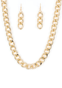 Brushed in a high-sheen shimmer, a bold gold chain drapes below the collar in an edgy industrial fashion. Features an adjustable clasp closure.  Sold as one individual necklace. Includes one pair of matching earrings.