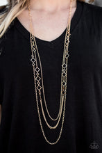 Load image into Gallery viewer, Layers of gold chain elegantly fall down the chest, creating a shimmery display. Sections of square-shaped frames are sprinkled along the chains, adding a bit of edge to the design. Features an adjustable clasp closure.  Sold as one individual necklace. Includes one pair of matching earrings.  Always nickel and lead free.