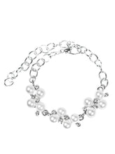 Load image into Gallery viewer, Small clusters of shimmery white pearls are dusted with sparkling rhinestones, creating a romantic timeless design. Features an adjustable clasp closure.  Sold as one individual bracelet.