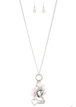 Load image into Gallery viewer, A silver bird charm, silver heart charms, and collection of white pearls and opaque pink crystal-like beads swing from the bottom of a lengthened silver chain for a whimsically clustered look. Features an adjustable clasp closure.  Sold as one individual necklace. Includes one pair of matching earrings.+- ./