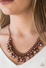 Load image into Gallery viewer, Varying in size, pearly copper beads and faceted copper teardrops drip from the bottoms of interlocking copper chains, creating a bold industrial fringe below the collar. Features an adjustable clasp closure.  Sold as one individual necklace. Includes one pair of matching earrings.  Always nickel and lead free.