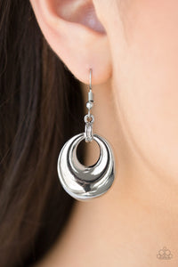 Brushed in a high-sheen finish, a silver frame swings from glistening silver fittings for a casual look. Earring attaches to a standard fishhook fitting.  Sold as one pair of earrings.  Always nickel and lead free