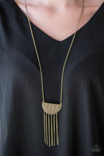 Load image into Gallery viewer, Embossed in radiating sunburst patterns, a tribal inspired pendant swings from the bottom of a glistening brass chain for a seasonal look. Dainty brass chains stream from the bottom of the crescent-shaped pendant, adding a wanderlust vibe to the indigenous look. Features an adjustable clasp closure.  Sold as one individual necklace. Includes one pair of matching earrings.  
