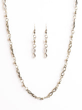 Load image into Gallery viewer, Brushed in a glistening shimmer, shiny brass beads and elegant infinity charms link into a timeless chain below the collar. Features an adjustable clasp closure.  Sold as one individual necklace. Includes one pair of matching earrings.