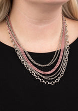 Load image into Gallery viewer, Painted in a colorful finish, shiny pink chains join a collision of silver chains below the collar for a daring industrial look. Features an adjustable clasp closure.  Sold as one individual necklace. Includes one pair of matching earrings.  