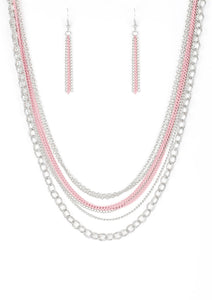 Painted in a colorful finish, shiny pink chains join a collision of silver chains below the collar for a daring industrial look. Features an adjustable clasp closure.  Sold as one individual necklace. Includes one pair of matching earrings.