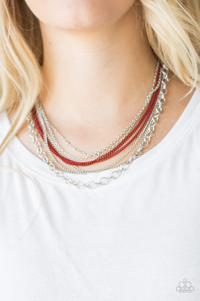 Painted in a robust finish, shiny red chains join a collision of silver chains below the collar for a daring industrial look. Features an adjustable clasp closure.  Sold as one individual necklace. Includes one pair of matching earrings.  Always nickel and lead free.