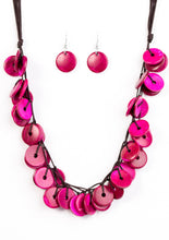 Load image into Gallery viewer, Shiny wooden discs brushed in a refreshing pink finish trickle along shiny brown cording, creating clustered layers below the collar. Features a button-loop closure.  Sold as one individual necklace. Includes one pair of matching earrings.