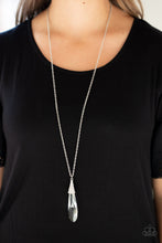 Load image into Gallery viewer, Capped in a silver frame radiating with glittery white rhinestones, a glassy teardrop pendant swings from the bottom of a lengthened silver chain for a jaw-dropping look. Features an adjustable clasp closure.  Sold as one individual necklace. Includes one pair of matching earrings.  Always nickel and lead free!