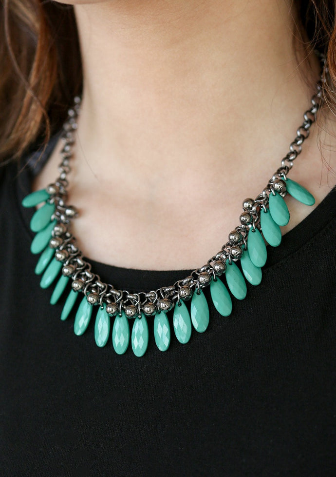 Tinted in the refreshing hue of Arcadia, faceted green teardrops and glistening gunmetal beads swing from the bottom of interlocking gunmetal chains, creating a spunky fringe below the collar. Features an adjustable clasp closure.  Sold as one individual necklace. Includes one pair of matching earrings. 