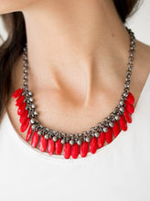 Load image into Gallery viewer, Faceted red teardrops and glistening gunmetal beads swing from the bottom of interlocking gunmetal chains, creating a spunky fringe below the collar. Features an adjustable clasp closure.  Sold as one individual necklace. Includes one pair of matching earrings.