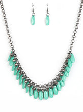 Load image into Gallery viewer, Tinted in the refreshing hue of Arcadia, faceted green teardrops and glistening gunmetal beads swing from the bottom of interlocking gunmetal chains, creating a spunky fringe below the collar. Features an adjustable clasp closure.  Sold as one individual necklace. Includes one pair of matching earrings.