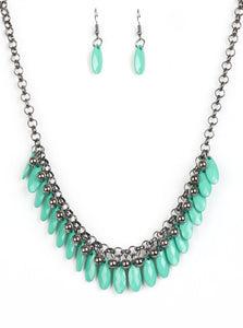 Tinted in the refreshing hue of Arcadia, faceted green teardrops and glistening gunmetal beads swing from the bottom of interlocking gunmetal chains, creating a spunky fringe below the collar. Features an adjustable clasp closure.  Sold as one individual necklace. Includes one pair of matching earrings.
