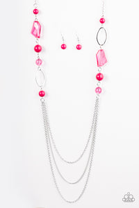 Faceted pink jewels and polished pink beads trickle along a shimmery silver chain for a seasonal look. Infused with shiny silver hoops, the colorful beading gives way to layers of chain for a whimsical finish. Features an adjustable clasp closure.  Sold as one individual necklace. Includes one pair of matching earrings.