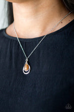 Load image into Gallery viewer, Chiseled into a tranquil teardrop, a glowing brown moonstone is pressed into an abstract silver frame, creating a whimsical pendant. Features an adjustable clasp closure.  Sold as one individual necklace. Includes one pair of matching earrings.  Always nickel and lead free.