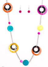 Load image into Gallery viewer, Chunky brightly-colored rings and discs with swirly marble finishes join thick metal hoops to climb a simple silver chain and create a retro-inspired feel. Features an adjustable clasp closure.  Sold as one individual necklace. Includes one pair of matching earrings.