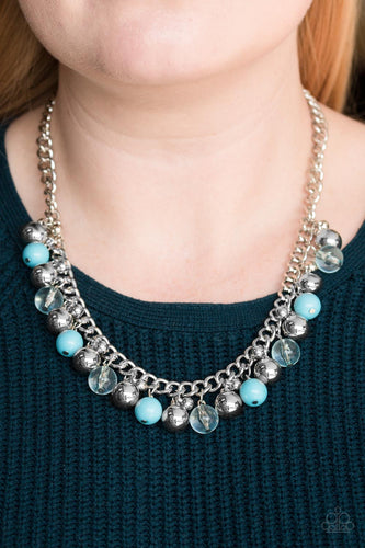 Featuring glassy and polished finishes, refreshing blue beads trickle along the bottom of a bold silver chain. Varying in size, glistening silver beads trickle between the colorful accents, creating a bubbly fringe below the collar. Features an adjustable clasp closure.  Sold as one individual necklace. Includes one pair of matching earrings.  Always nickel and lead free.