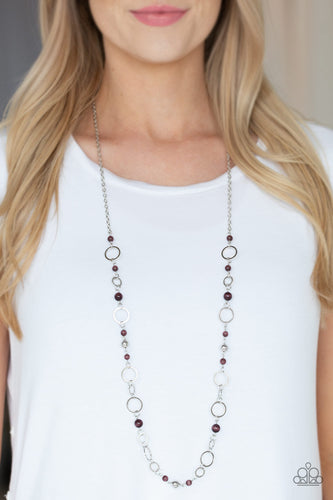 Shimmery silver hoops and glowing purple moonstone beads connect into a whimsical chain across the chest. Features an adjustable clasp closure.  Sold as one individual necklace. Includes one pair of matching earrings.  Always nickel and lead free!